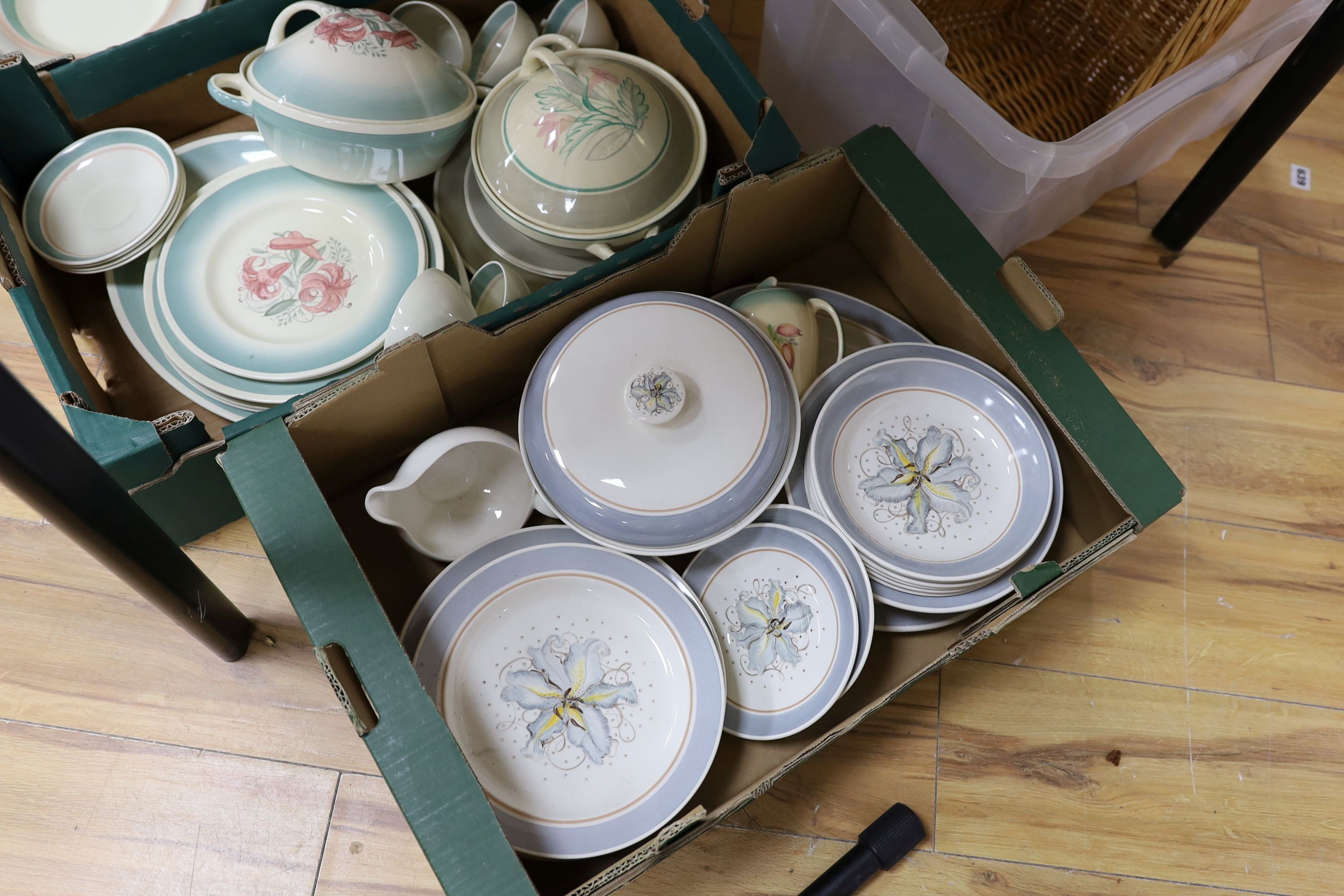 A large quantity of Susie Cooper tableware, Wedding Band, Tiger Lily and Blue Magnolia